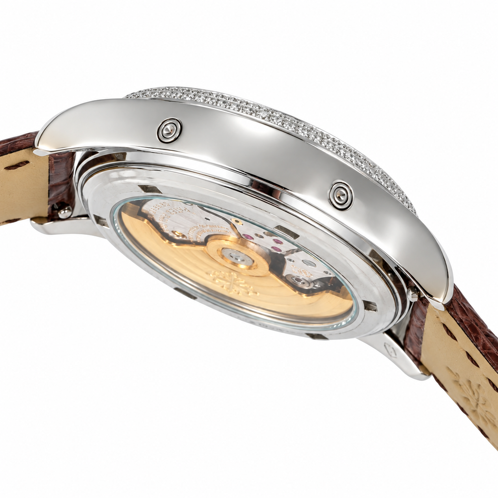 Patek Philippe Ladies Annual Calendar White Gold Double Diamond Bezel Blue MOP Dial Roman Numerals Moon Phase Brown Strap 38mm