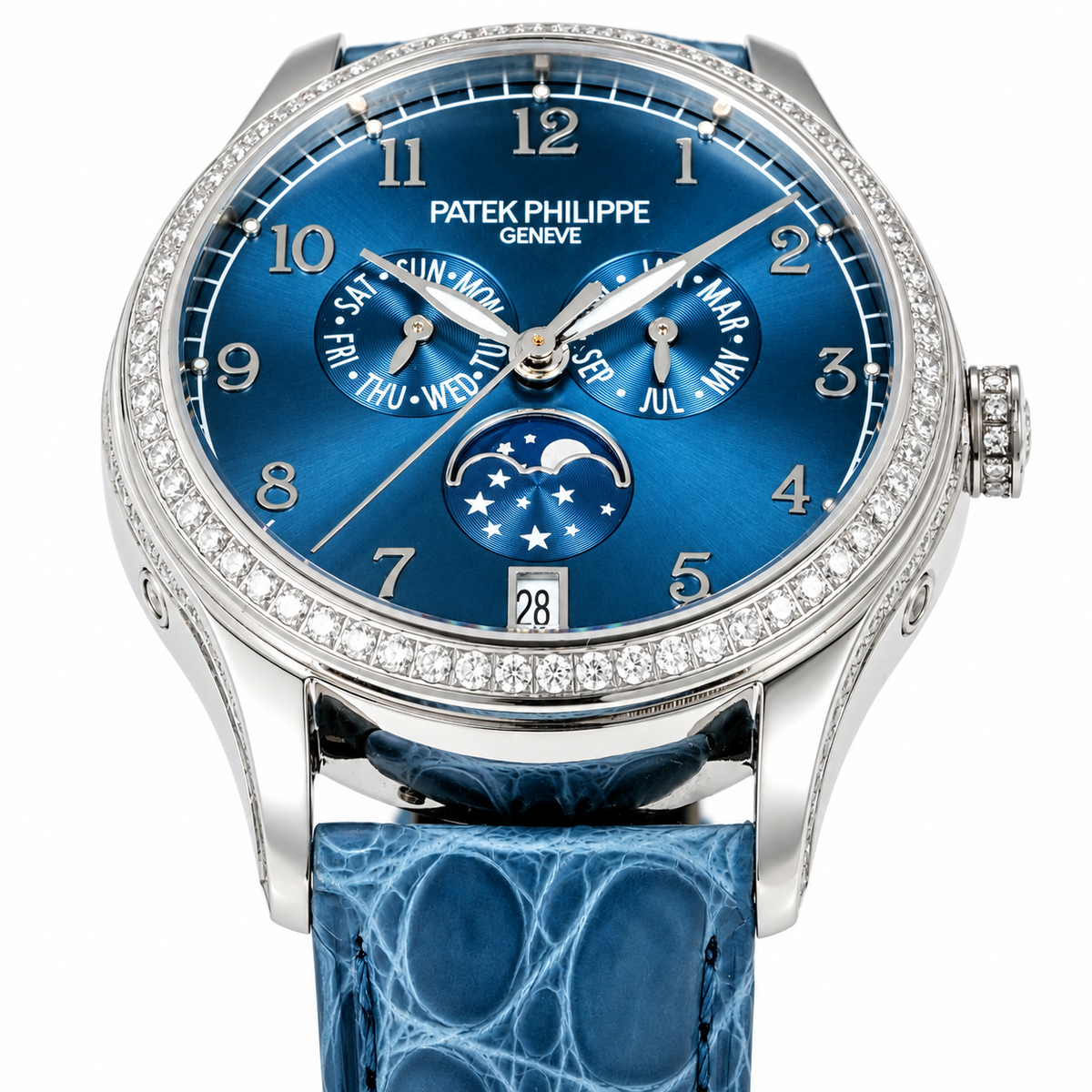 Patek Philippe Ladies Complications White Gold Round Diamond Bezel Blue Dial Arabic Numerals Annual Calendar Moon Phase Date Blue Strap 38mm