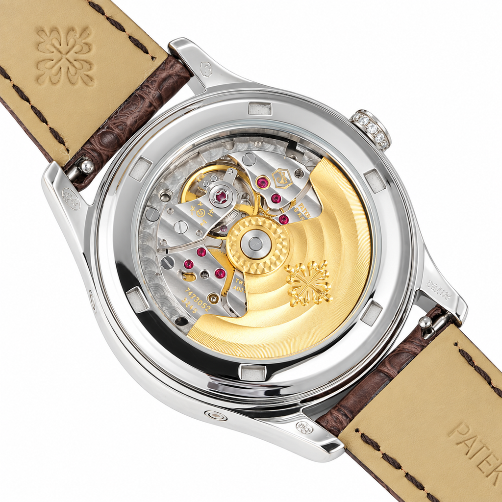 Patek Philippe Ladies Annual Calendar White Gold Double Diamond Bezel Blue MOP Dial Roman Numerals Moon Phase Brown Strap 38mm